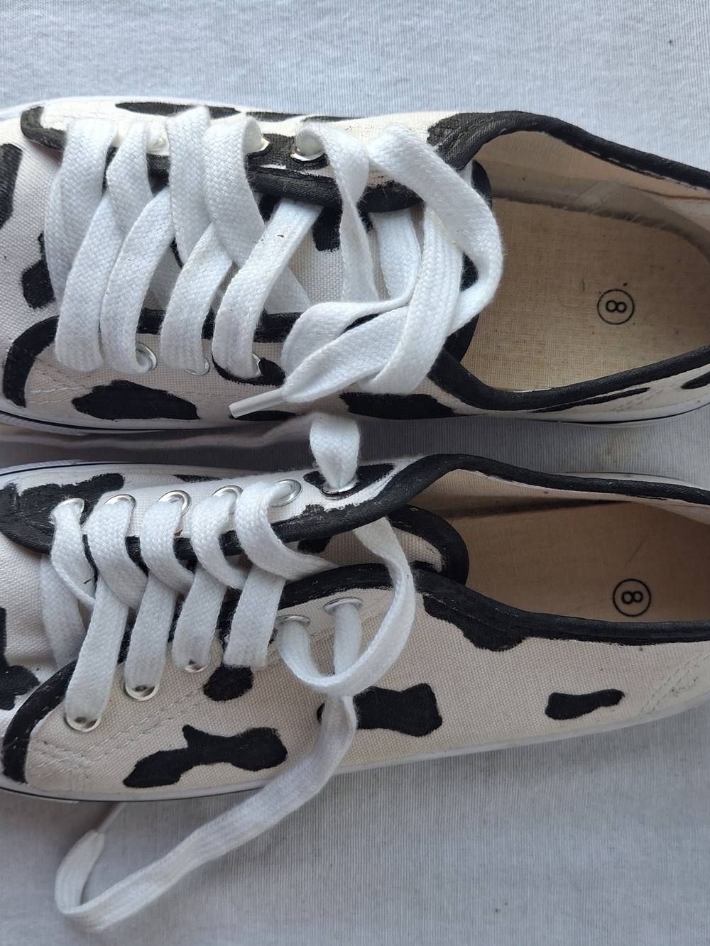 White Canvas Sneakers with Black Cow Print
